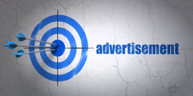 Marketing concept: target and Advertisement on wall background