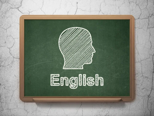 Education concept: Head and English on chalkboard background — Stock Photo, Image