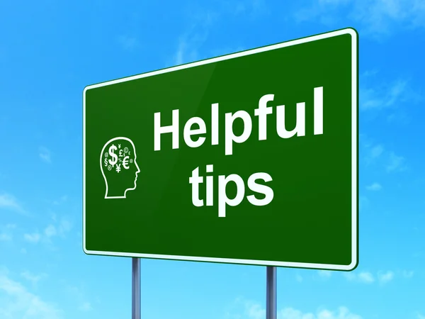 Education concept: Helpful Tips and Head With Finance Symbol on road sign background — Stock Photo, Image