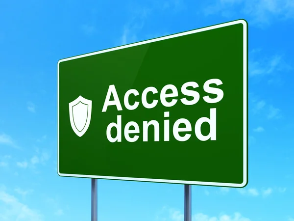 Privacy concept: Access Denied and Shield on road sign background — Stock Photo, Image