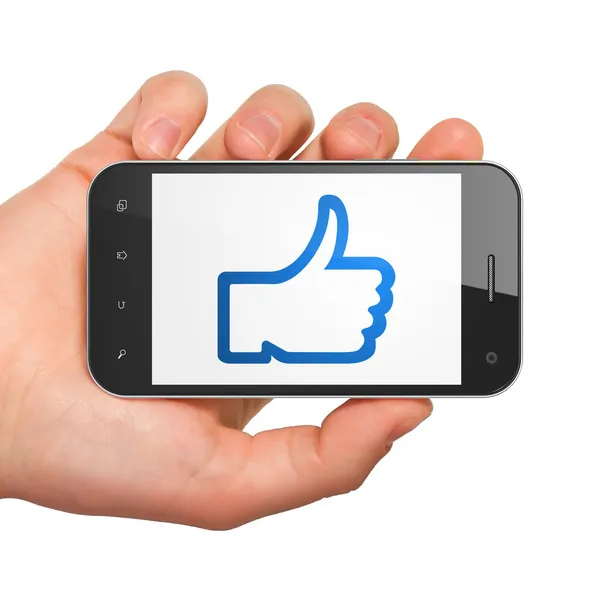 Social network concept: Thumb Up on smartphone — Stock Photo, Image