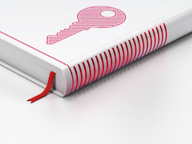 Emniyet konsepti: kapalı kitap, beyaz arka plan üzerinde anahtar