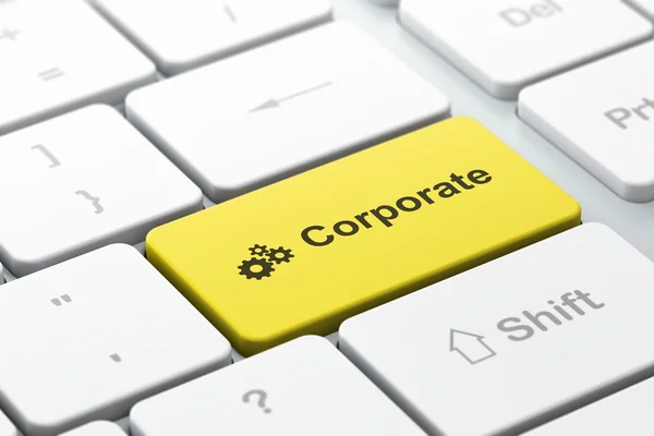 Финансовая концепция: шестерни и корпоративные на фоне компьютерной клавиатуры — стоковое фото
