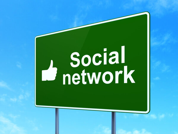 Social network concept: Social Network and Thumb Up on road sign background