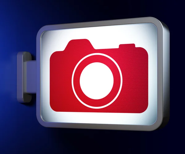 Vakantie concept: fotocamera op billboard achtergrond — Stockfoto