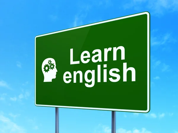 Education concept: Learn English and Head Gears on road sign — Stock Photo, Image