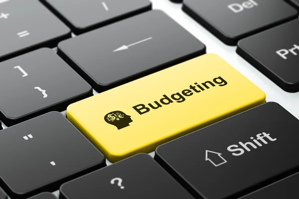 Finans konceptet: huvudet med finans symbol och budgetering på dator tangentbord bakgrund — Stockfoto