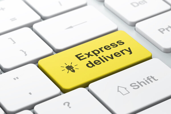 Business concept: Energy Saving Lamp and Express Delivery on computer keyboard background