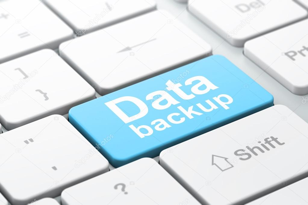 Information concept: Data Backup on computer keyboard background