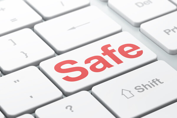 Privacy concept: Safe on computer keyboard background