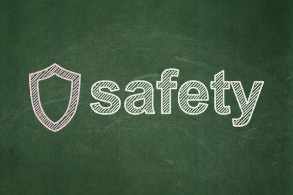 Security concept: Contoured Shield and Safety on chalkboard background — Stock Photo, Image