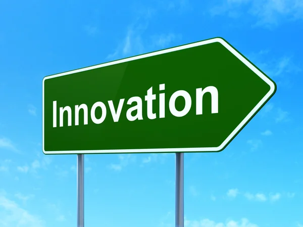 Ekonomi kavramı: yenilik yol işareti arka plan üzerinde — Stok fotoğraf