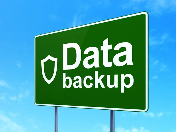 Information concept: Data Backup and Contoured Shield on road sign background — Stock Photo, Image