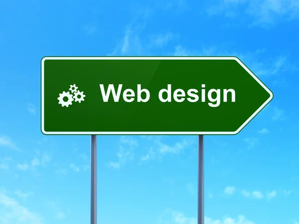 Concept de développement Web : Web Design et engrenages sur fond de panneau routier — Photo