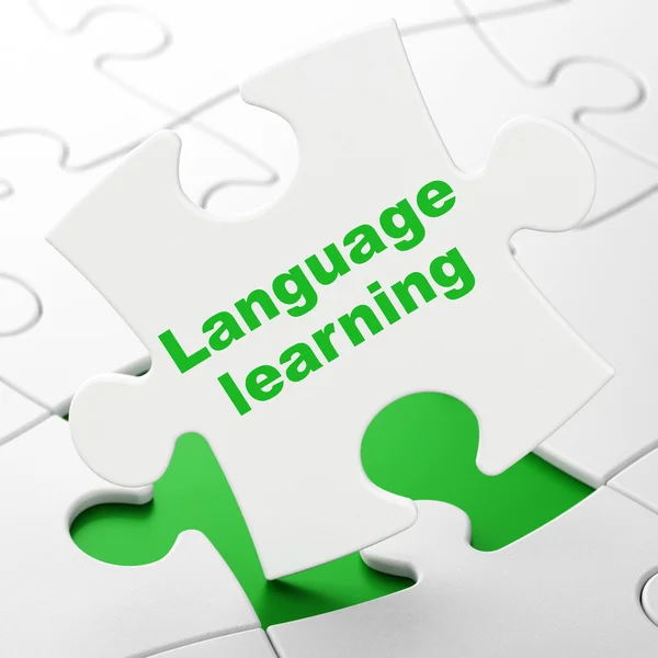 Education concept: Language Learning on puzzle background — Stock Photo, Image