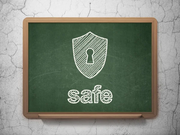 Privacy concept: Shield With Keyhole and Safe on chalkboard background — Stock Photo, Image