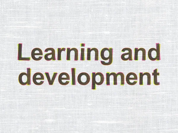Vzdělávací koncepce: učení a rozvoje na textilie textura pozadí — Stock fotografie
