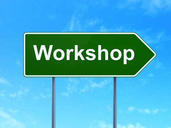 Conceito de educação: Workshop on road sign background — Fotografia de Stock