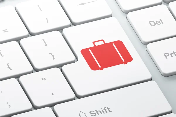 Tourism concept: Bag on computer keyboard background — Stock Photo, Image