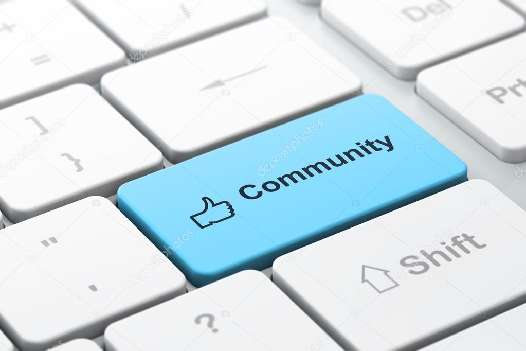 Social media concept: Thumb Up and Community on computer keyboard background