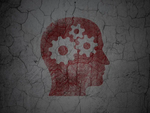 Onderwijs concept: hoofd met Gears op grunge muur achtergrond — Stockfoto
