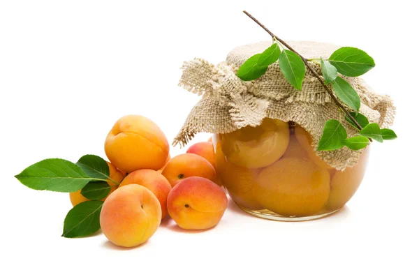 Fresh apricots and jam from apricots in glass jar — Stock Photo, Image