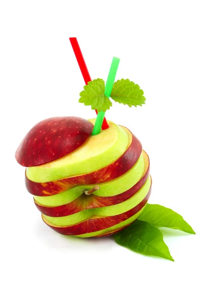 Gesneden apple met een rietje binnen — Stockfoto