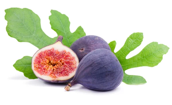 Ripe figs with red, juicy pulp and green leaves — Stock Photo, Image