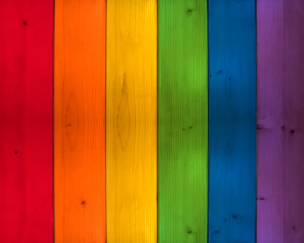 彩色彩色板的背景彩虹和Lgbt旗的颜色 木制质感 多彩的图画现代围栏 — 图库照片