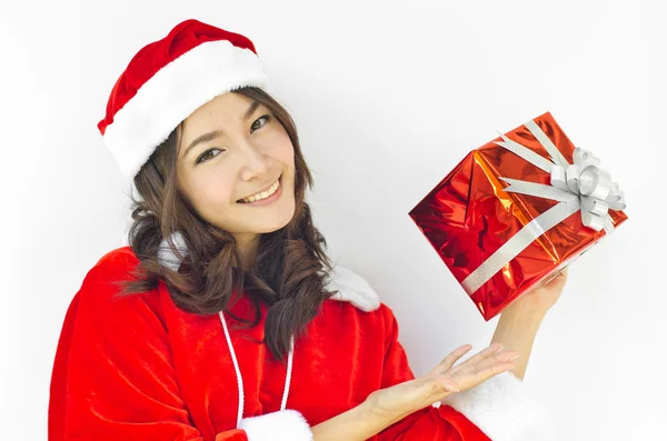 Santa claus hat with grey christmas gift box — Stock Photo, Image