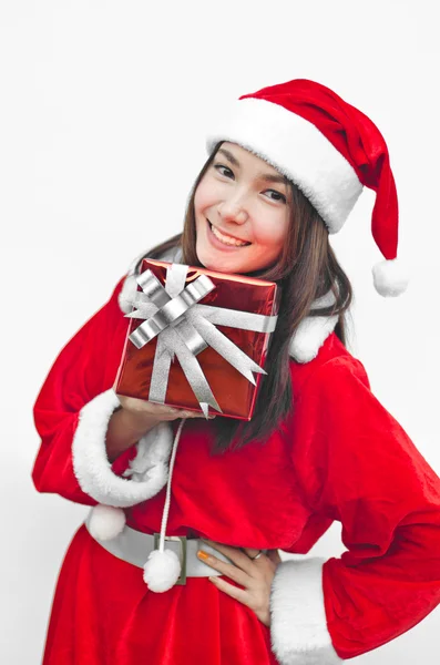 Weihnachtsmann Hut mit roter Weihnachtsgeschenkschachtel — Stockfoto