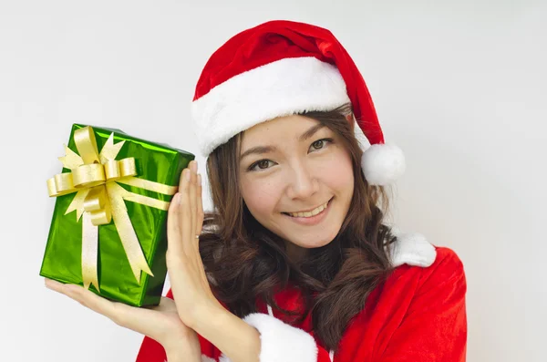 Santa claus hat with green christmas gift box — Stock Photo, Image