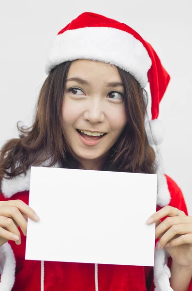 Girl in Santa holding banner. — Stock Photo, Image