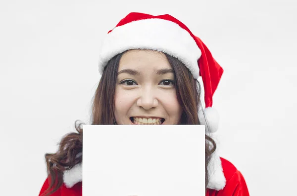 Chica en Santa sosteniendo pancarta . —  Fotos de Stock