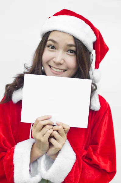 Chica en Santa sosteniendo pancarta . —  Fotos de Stock