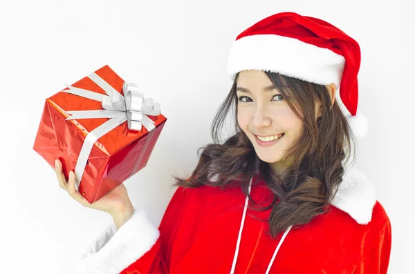 Santa claus hat with grey christmas gift box — Stock Photo, Image