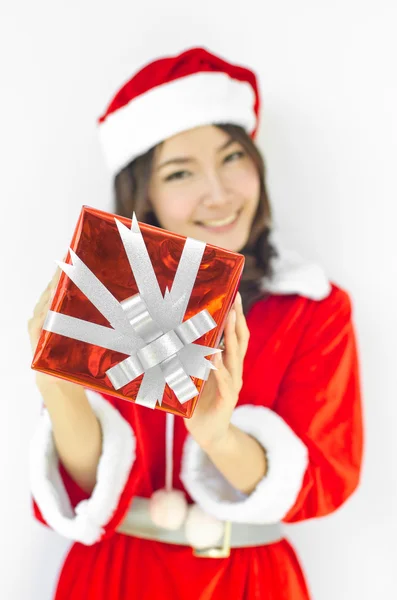 Santa claus hat with grey christmas gift box — Stock Photo, Image