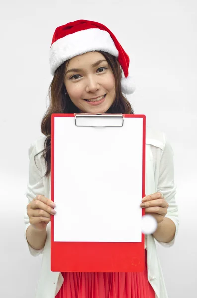 Flicka i santa hatt hålla banner. — Stockfoto