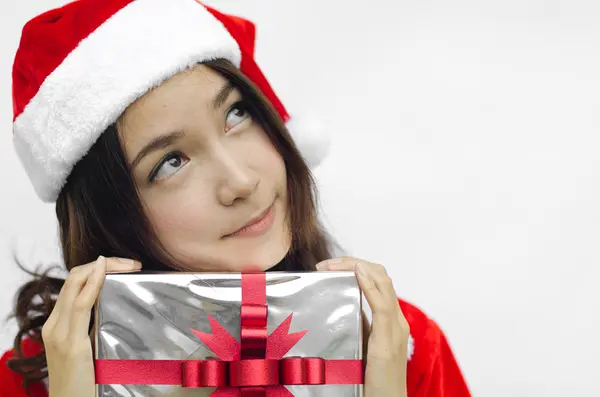 Sombrero de santa claus con caja de regalo de Navidad gris —  Fotos de Stock