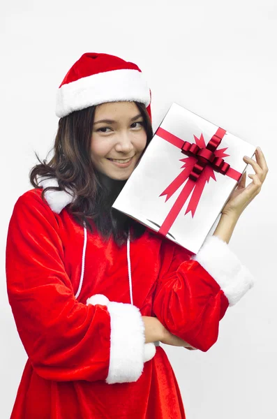 Santa claus hat with grey christmas gift box — Stock Photo, Image