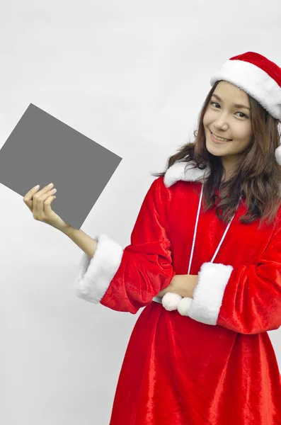 Girl in Santa holding banner. — Stock Photo, Image