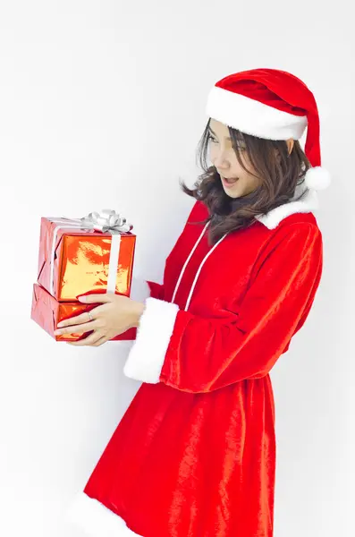 Santa claus hat with grey christmas gift box — Stock Photo, Image