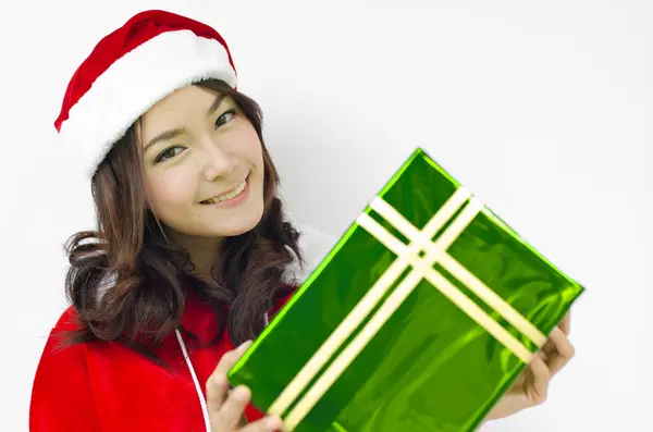 Santa claus klobouk s zelené Vánoční dárková krabička — Stock fotografie