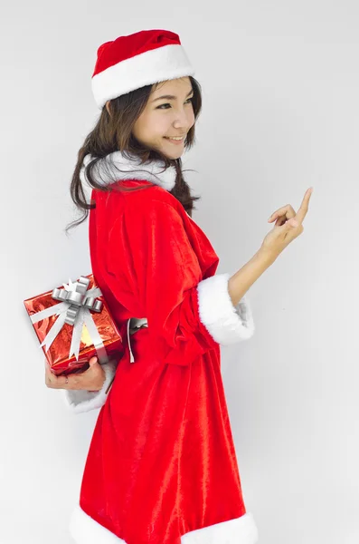 Santa claus hat with red christmas gift box — Stock Photo, Image