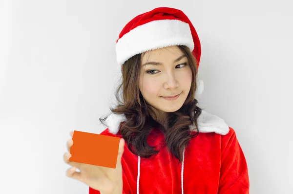 Girl in Santa holding red card — Stock Photo, Image