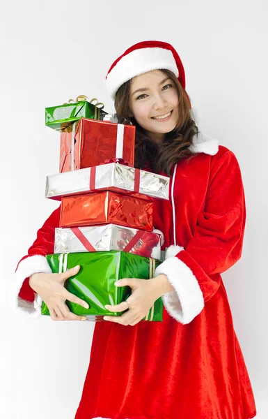 Santa claus hat with christmas gift boxes — Stock Photo, Image