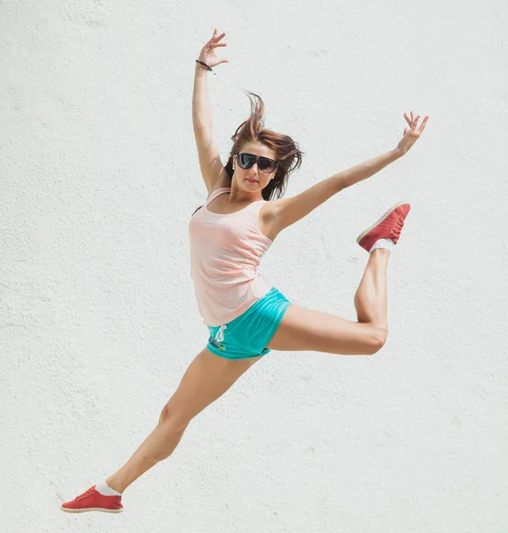 Young excited girl jumping Stock Picture