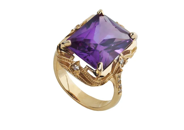 Gold ring with a precious stone lilac color on white background — Stock Photo, Image