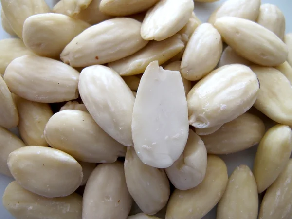 Background peeled almonds — Stock Photo, Image