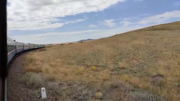 Passenger Train Moves Steppe Summer Clouds — Stockvideo